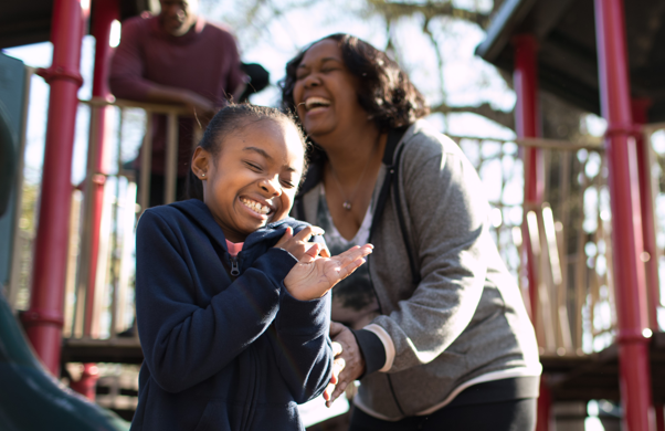 Mom with child on playground